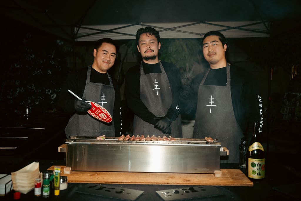 San Ban Yakitori team grilling over charcoal